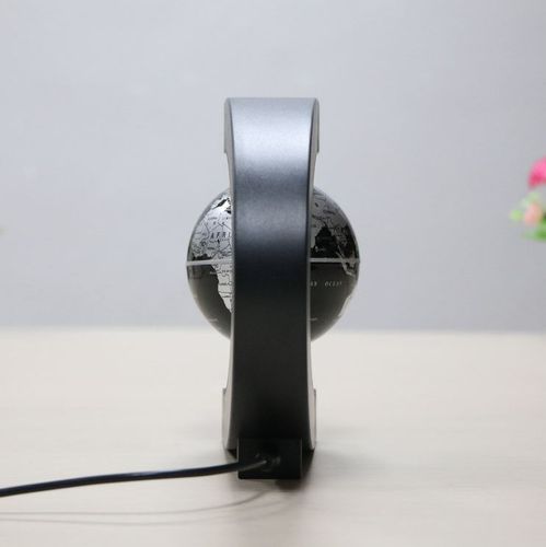 Lewitujący globus czarny na Arena.pl