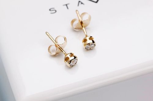 Złote kolczyki KXD4897 - Diament na Arena.pl