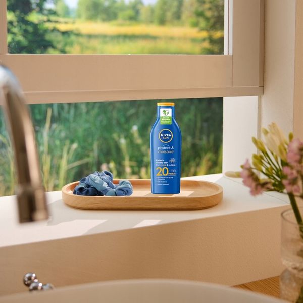 NIVEA SUN Protect & Moisture Balsam do opalania SPF 20, 200 ml zdjęcie 5