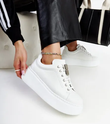 Białe skórzane sneakersy Karino 41 na Arena.pl