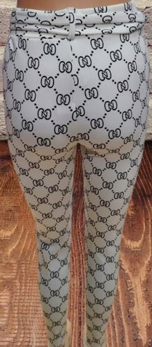 SPODNIE ELASTYCZNE Z KIESZENIAMI ozdobnym PASKIEM jasne z wzorkiem S/M na Arena.pl