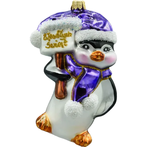 Bombka choinkowa: Pingwin w czapce Świętego Mikołaja na Arena.pl