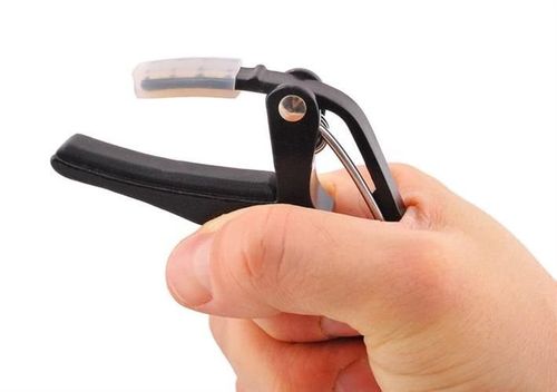 Kapodaster do gitary na Arena.pl