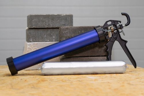 Pistolet wyciskacz do silikonu mas uszczelniacza klejów 600ml MOCNY na Arena.pl