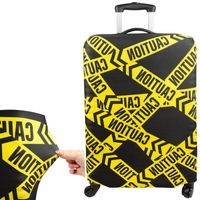 Pokrowiec Sillar materiałowy na walizkę z motywem taśmy ostrzegawczej