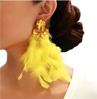 Złote żółte długie KOLCZYKI z piórkami pozłacane sztyfty cyrkonie kryształy