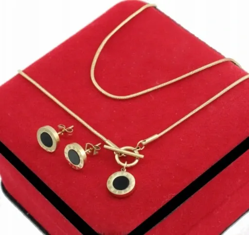 KOMPLET ZŁOTY ŻMIJKI CZARNE OCZKO STAL CHIRURGICZNA 316 L zdjęcie 1