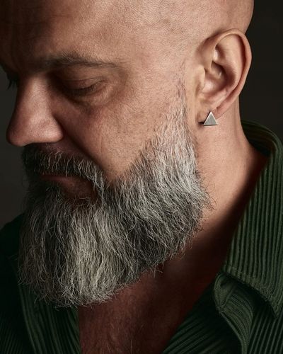 Srebrny kolczyk THE ROCK na Arena.pl