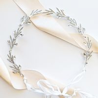 EFEKTOWNA opaska na włosy SREBRNA z cyrkoniami i listkami błyszcząca