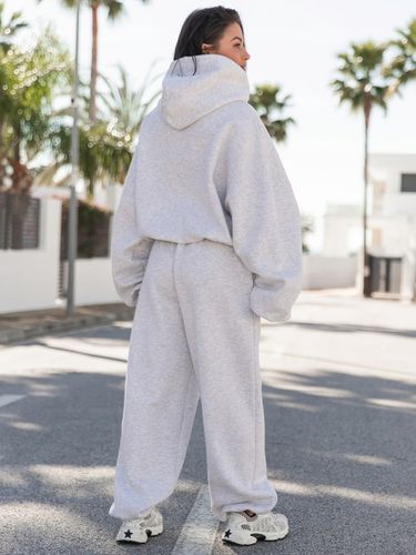 Spodnie dresowe bawełniane damskie baggy szerokie oversize szary melanż na Arena.pl