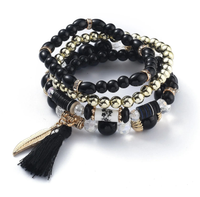 Zestaw bransoletek z koralików czarne chwost piórko