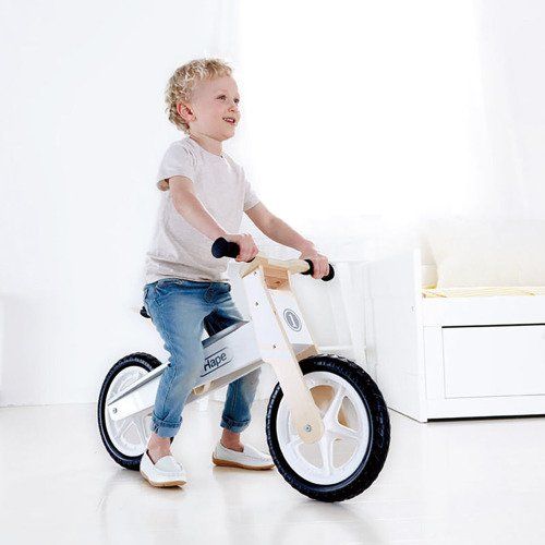HAPE Drewniany Rowerek biegowy na Arena.pl