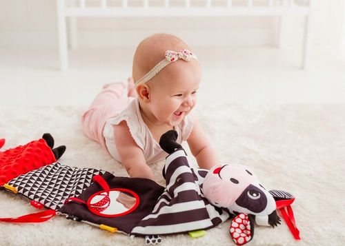 BaliBaZoo KSIĄŻECZKA HARMONIJKA KRÓWKA sensoryczna do łóżeczka dwustronna na Arena.pl