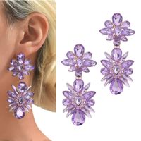 Duże efektowne kolczyki pokaz fioletowe złote lawendowe kryształki wesele