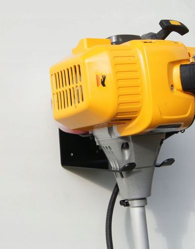 WIESZAK UCHWYT DO ŚCIANY MOCOWANIE DO KOSY SPALINOWEJ PODKASZARKI na Arena.pl