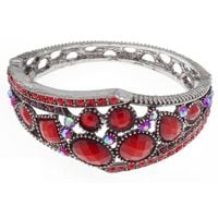 Metalowa sztywna bransoletka czerwone kamienie