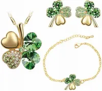 Złoty zestaw biżuterii złocony szmaragdowe koniczynki