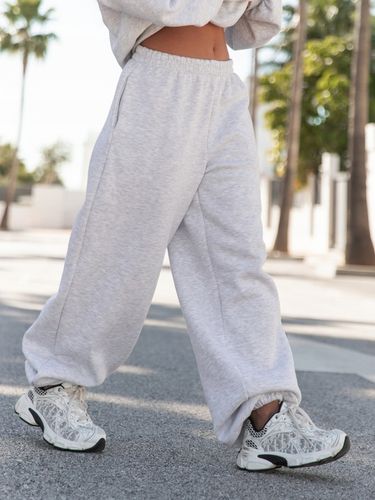 Spodnie dresowe bawełniane damskie baggy szerokie oversize szary melanż na Arena.pl