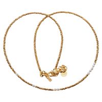 Naszyjnik urodzeniowy czerwiec- białe perły, hematyt i srebro złocone