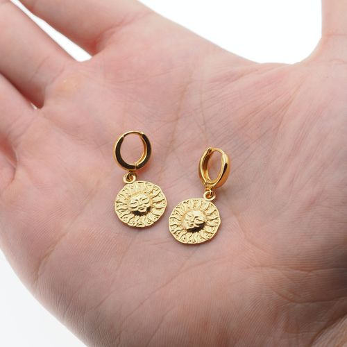 Kolczyki na biglach kajdankach- słońce i srebro złocone na Arena.pl