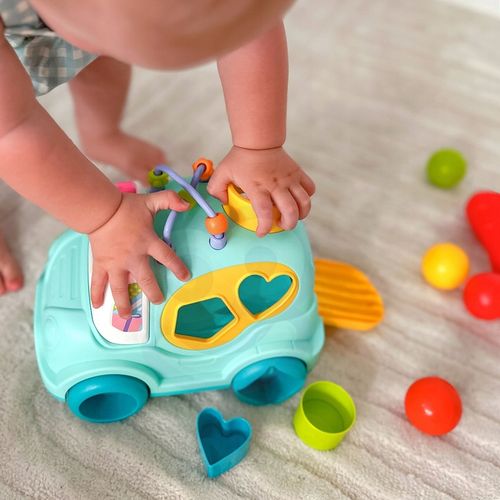 AUTO SORTER WESOŁY SAMOCHODZIK Z KLOCKAMI WBIJAK MONTESSORI LABIRYNT WOOPIE na Arena.pl