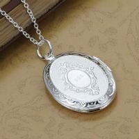 MEDALION NASZYJNIK OWALNY KOLOR SREBNY DWA ZDJĘCIA