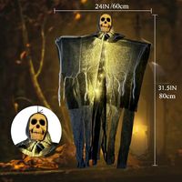 Halloweenowa czaszka szkieletu z gazy, wiszący duch – Warm Light
