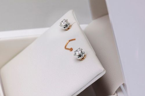 Złote kolczyki KXD2500 - Diament na Arena.pl