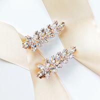 ZŁOTE spinki do włosów minimalistyczne listki kwiatowe cyrkonie ŚLUBNE