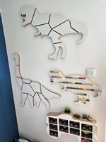 Ekspozytor na ludziki minifigur dinozaur T. Rex do pokoju dziecka na ścianę