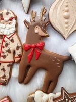 PIERNICZEK ZAMYŚLONY RENIFER Z KOKARDĄ