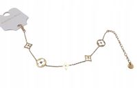 Elegancka bransoletka celebrytka perłowe kwiatki różne wzory kolor złoty