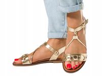 ZŁOTE SANDAŁY DAMSKIE BŁYSZCZĄCE NA PŁASKIEJ PODESZWIE ZŁOTA OZDOBA r 40