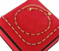 KOMPLET 2 CZ ZŁOTE KULKI CZARNE KORALIKI STAL