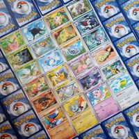 Zestaw 50 kart Pokemon w tym 10 holo|NOWE ORYGINALNE| Tylko najnowsze sety