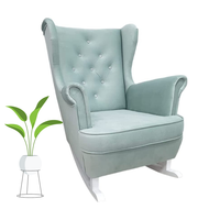 FOTEL USZAK BUJANY NA DREWNIANYCH PŁOZACH PIKOWANY