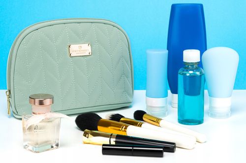 praktyczna kosmetyczka damska w kolorze zielonym pokryta jodełkowym na Arena.pl