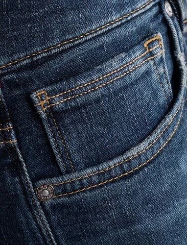 GUESS M5BAS2D0582 TTWE SPODNIE 33/34 na Arena.pl