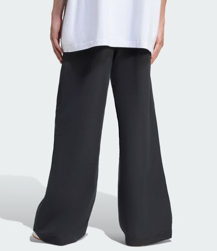 Spodnie dzwony oversize ADIDAS `32 na Arena.pl