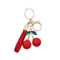 brelok do kluczy czerwone wisienki z cyroniami złoty brl365