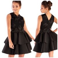 ELEGANCKA SUKIENKA CZARNA Z FALBANAMI ZDOBIONA XL