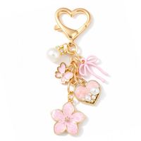 brelok do kluczy różowy kwiat, serce, kokardka, złoty brl414r