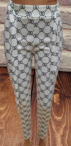 SPODNIE ELASTYCZNE Z KIESZENIAMI ozdobnym PASKIEM jasne z wzorkiem S/M zdjęcie 8