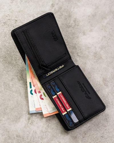 Portfel męski ze skóry eko Peterson z ochroną RFID STOP na gotówkę karty na Arena.pl