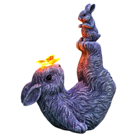 Figurka ogrodowa solarna lampka LED króliki szara żywica UV 23 cm