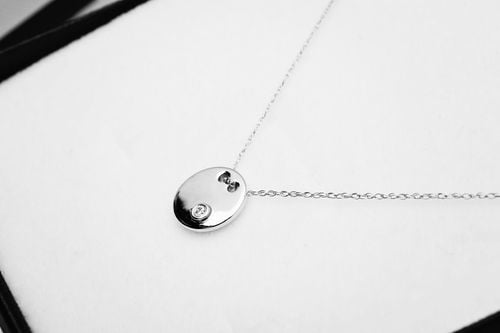naszyjnik z brylantem w białym złocie na Arena.pl