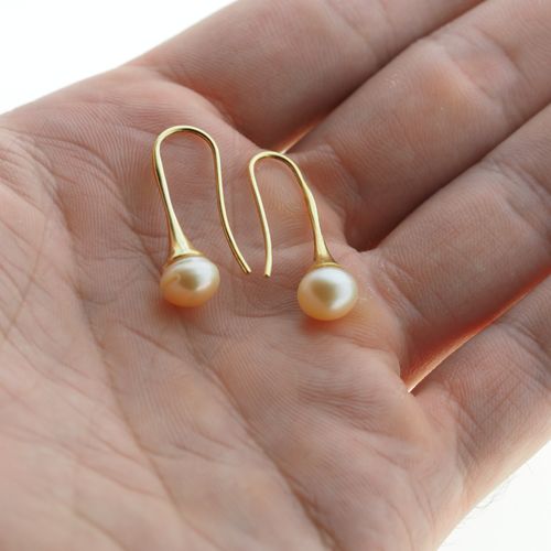 Kolczyki trąbki- łososiowe, okrągłe Perły w srebrze złoconym na Arena.pl