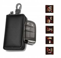 PUDEŁKO ZABEZPIECZAJĄCY SYGNAŁ KLUCZYKA SAMOCHODOWEGO PRZED KRADZIEŻĄ