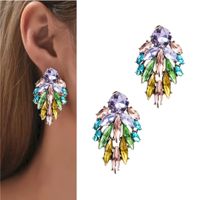 Eleganckie kolczyki sztyfty krótkie ozdobne rozety lekkie wieczorowe