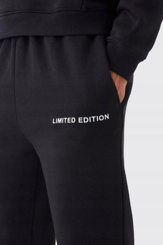 CZARNA BLUZA DRESOWA Z KAPTUREM KANGURKA OVERSIZE NADRUK BOOHOO M na Arena.pl